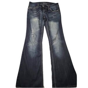 Vanity women’s blue jeans size 27W/31L. Back detail on pockets barely worn